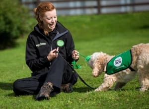 assistance dog trainer with dog