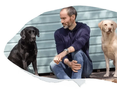 Andrew Cotter with dogs Olive and Mabel