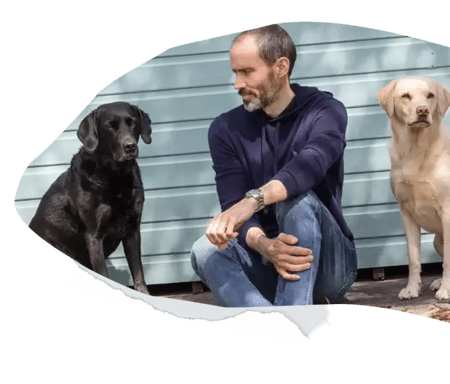 Andrew Cotter with dogs Olive and Mabel