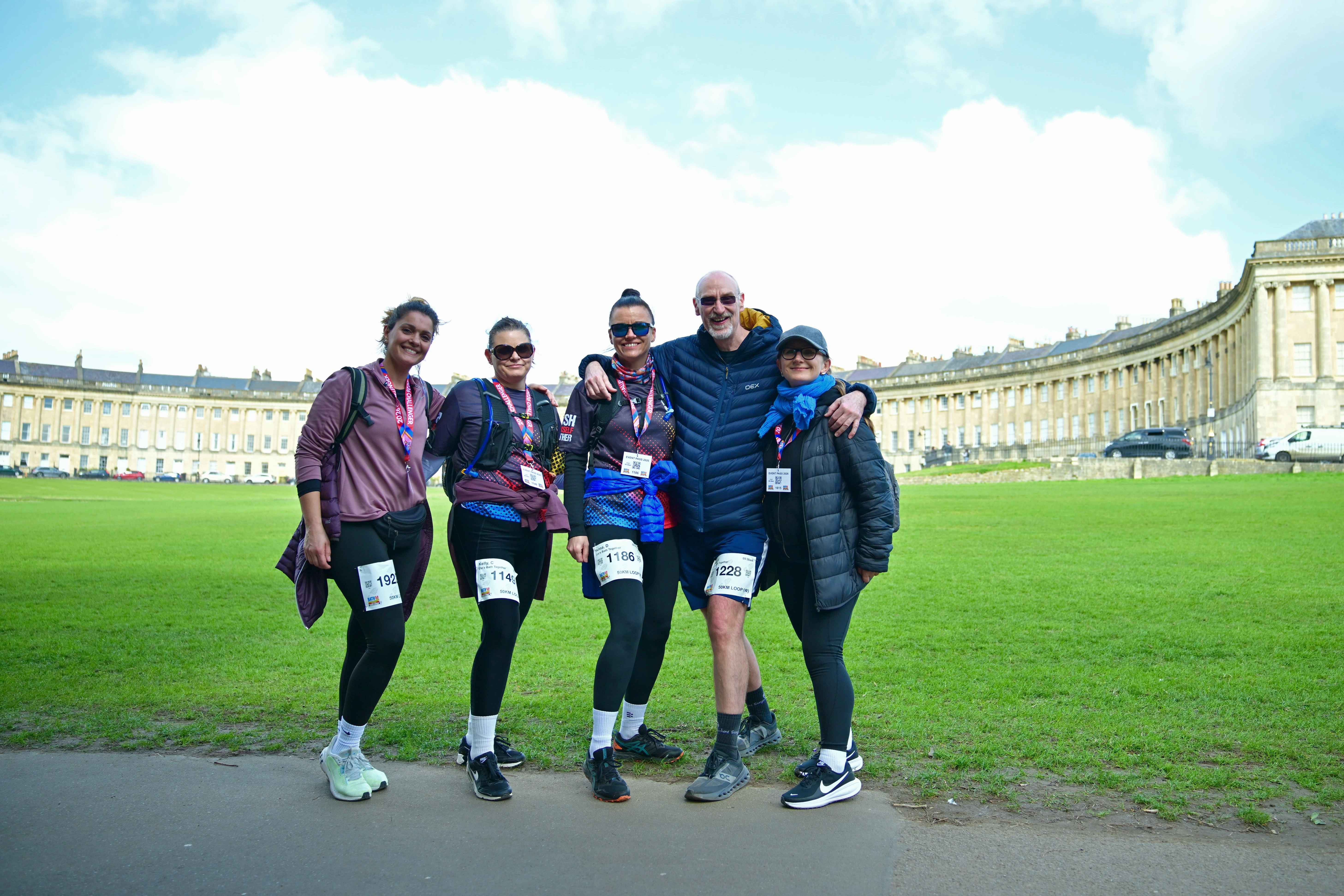 Five Bath 50 Ultra Challenge participants standing together smiling in front of the Royal Crescent in Bath