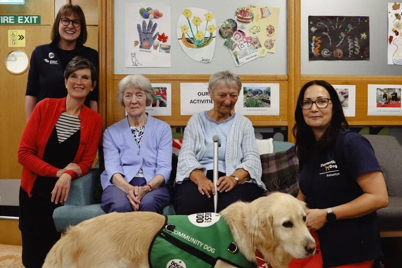 PAWS For Thought Group Sitting With Community Dog Sandy