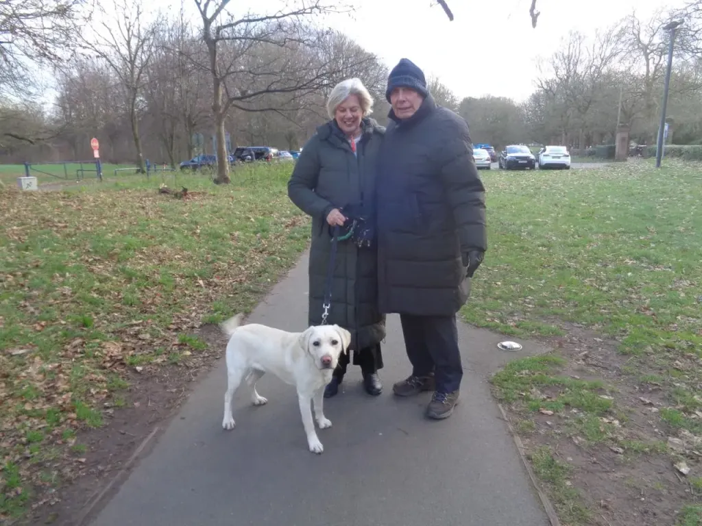 Volunteer+Socialisers+Debbie+And+Sam+Out+For+A+Walk+With+Puppy+Nancy