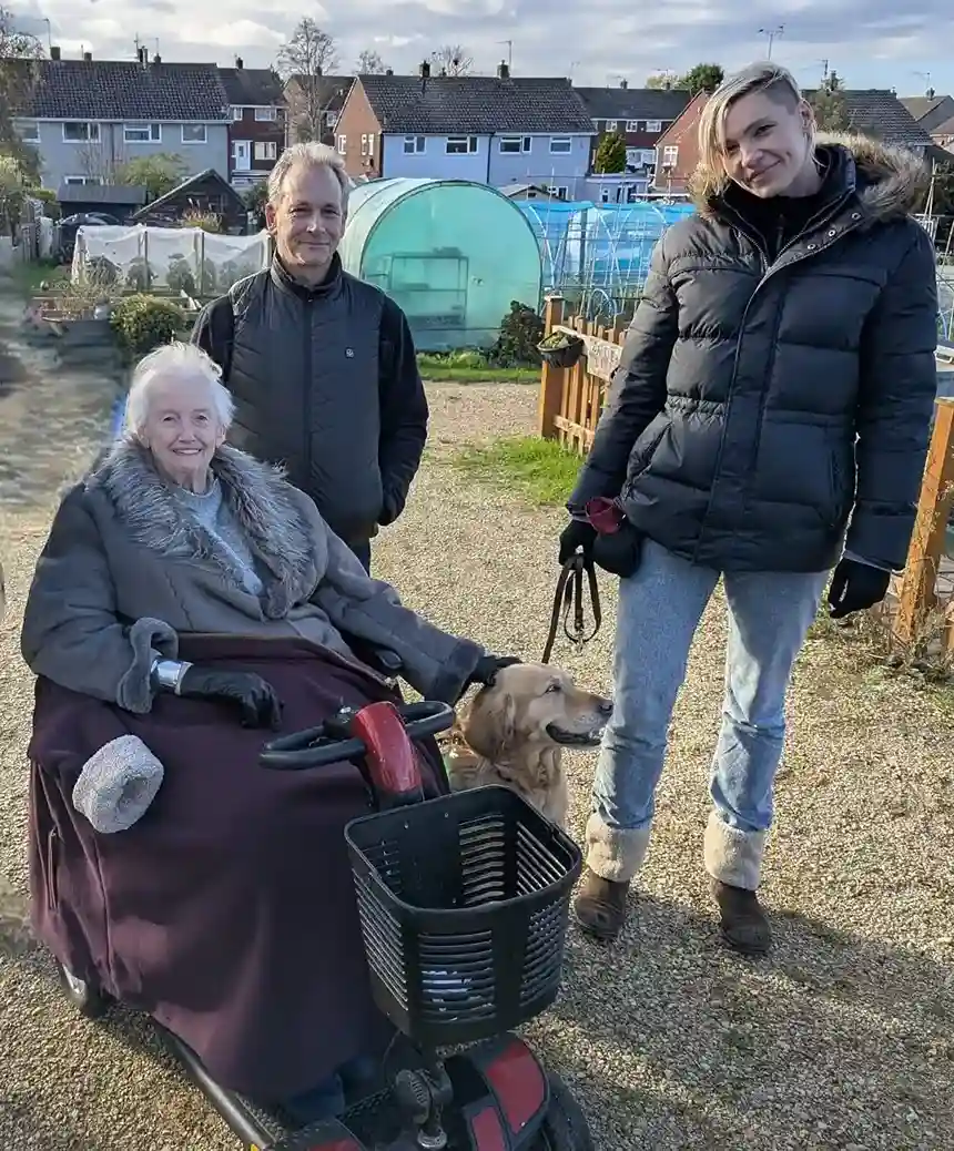 Carol, Paul, Julia And Georgie Standing Together Outside Smiling