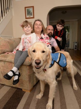 Golden Retriever 'Quartz' an Autism Awareness Dog has helped Beth Fletcher and turned around the lives of her family. Nuneaton.