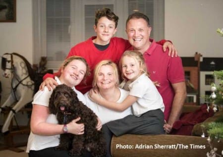 Beth, dad Mark and dog Maddie along with the rest of their family at home at Christmas time