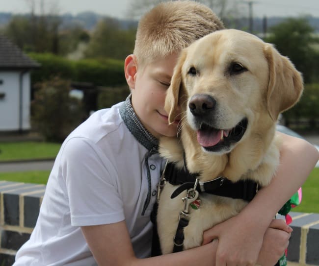 Joel and autism assistance dog Caddie