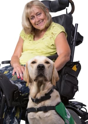 Ann and assistance dog Twickers