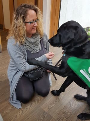 Lisa with assistance dog Rory 