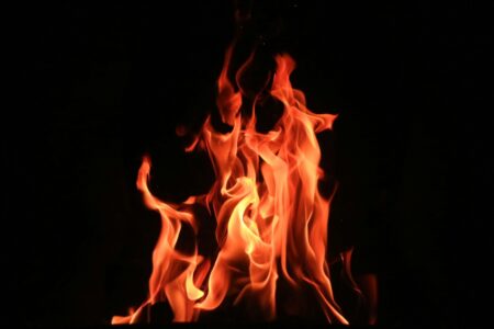Burning fire on black background