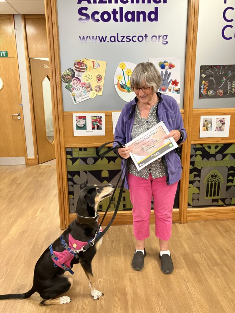 Christine and Ruby holding their assessment certificate